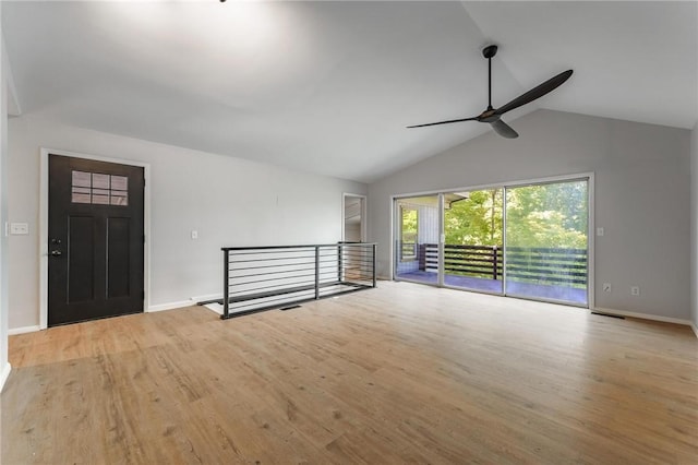 25 Grisham Cir, Bella Vista, AR 72715 - unfurnished living room featuring a ceiling fan, lofted ceiling, and wood finished floors