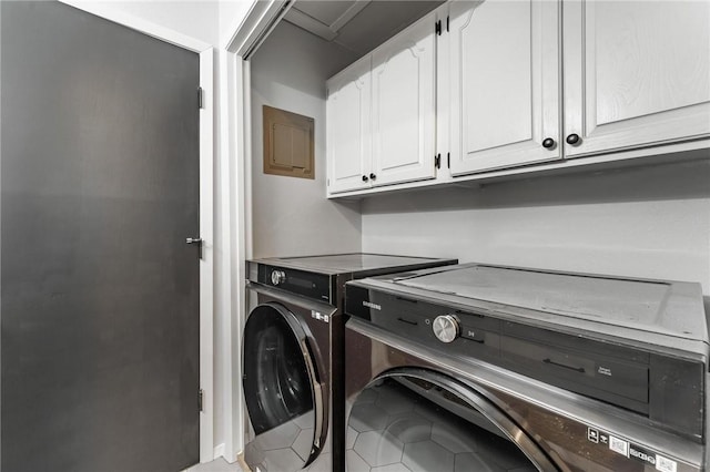 25 Grisham Cir, Bella Vista, AR 72715 - laundry area featuring washer and dryer, cabinet space, and tile patterned floors