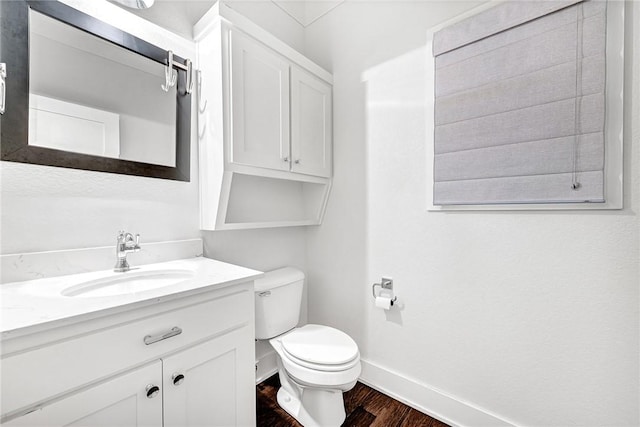464 Block Ave, Fayetteville, AR 72701 - bathroom featuring wood finished floors and vanity