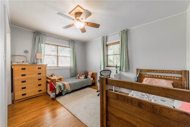 805 S Oak Hill St, Siloam Springs, AR 72761 - bedroom featuring wood finished floors, crown molding, and a ceiling fan