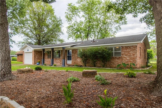 805 S Oak Hill St, Siloam Springs, AR 72761 - single story home with brick siding, an attached garage, and a porch