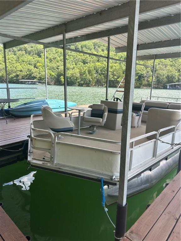393 Timberlake Ln, Eureka Springs, AR 72631 - dock area with a forest view and boat lift