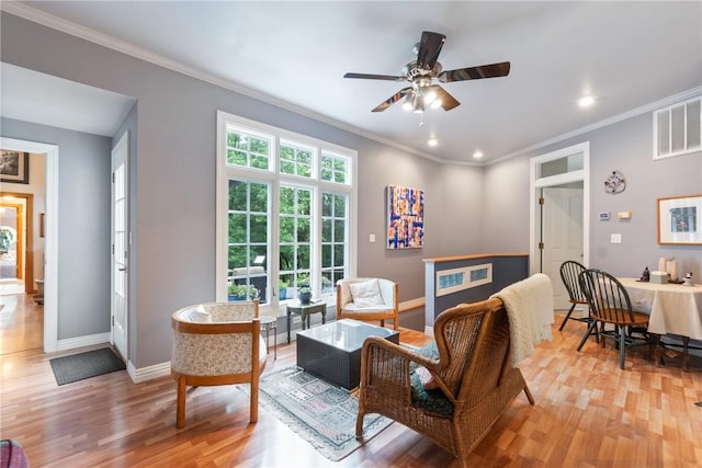 393 Timberlake Ln, Eureka Springs, AR 72631 - living room with light wood-style floors, ornamental molding, ceiling fan, and recessed lighting
