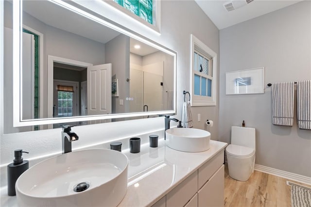 393 Timberlake Ln, Eureka Springs, AR 72631 - full bath with a shower stall, wood finished floors, and double vanity