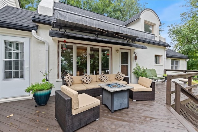 393 Timberlake Ln, Eureka Springs, AR 72631 - wooden deck featuring an outdoor living space with a fire pit