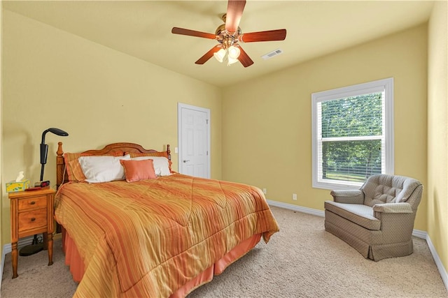 141 Hawn Ave, Huntsville, AR 72738 - bedroom with light carpet and ceiling fan