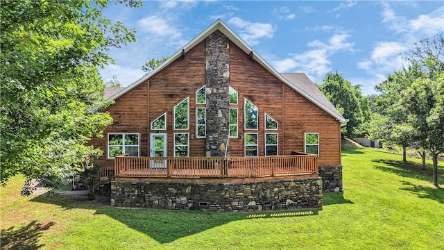 141 Hawn Ave, Huntsville, AR 72738 - rear view of house with a lawn and a deck