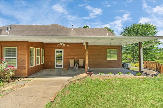 141 Hawn Ave, Huntsville, AR 72738 - rear view of property featuring ceiling fan, a patio area, and a shingled roof