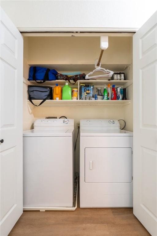 21271 Maple Dr, Garfield, AR 72732 - laundry area featuring washing machine and clothes dryer and light wood-type flooring