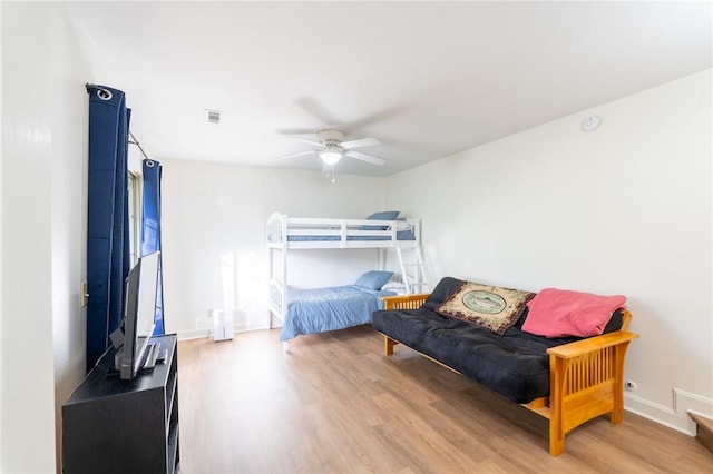 21271 Maple Dr, Garfield, AR 72732 - bedroom with light wood finished floors and a ceiling fan