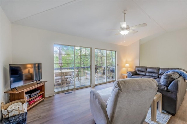 21271 Maple Dr, Garfield, AR 72732 - living room featuring wood finished floors, ceiling fan, and lofted ceiling