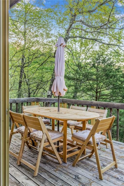 21271 Maple Dr, Garfield, AR 72732 - wooden deck with outdoor dining space