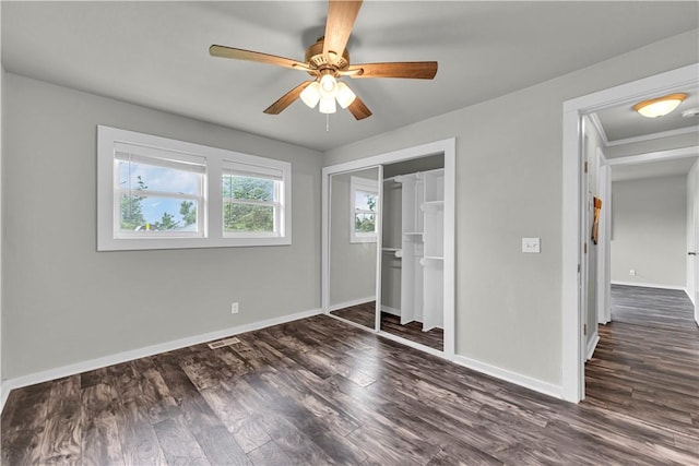 1603 W Poplar St, Rogers, AR 72758 - unfurnished bedroom with wood finished floors, a closet, and ceiling fan