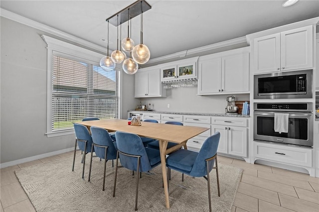 801 Bellmara Cir, Cave Springs, AR 72718 - kitchen featuring appliances with stainless steel finishes, white cabinetry, a chandelier, and crown molding
