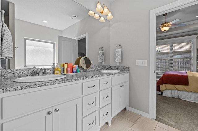 801 Bellmara Cir, Cave Springs, AR 72718 - ensuite bathroom featuring double vanity, a ceiling fan, and tile patterned floors