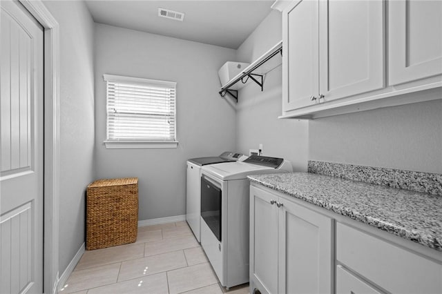 801 Bellmara Cir, Cave Springs, AR 72718 - laundry area with washing machine and dryer and cabinet space