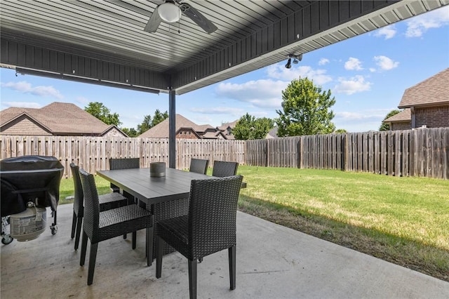 801 Bellmara Cir, Cave Springs, AR 72718 - fenced backyard featuring ceiling fan, a patio, outdoor dining area, and a grill