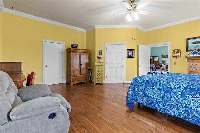 617 County Road 736, Berryville, AR 72616 - bedroom with ornamental molding, wood finished floors, and ceiling fan