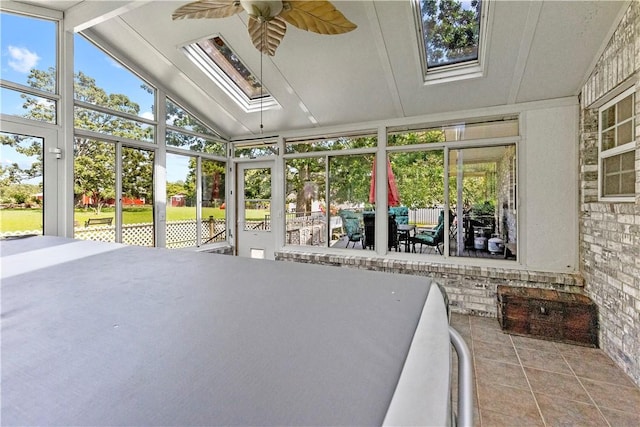 617 County Road 736, Berryville, AR 72616 - sunroom / solarium with a skylight, lofted ceiling, a ceiling fan, and plenty of natural light