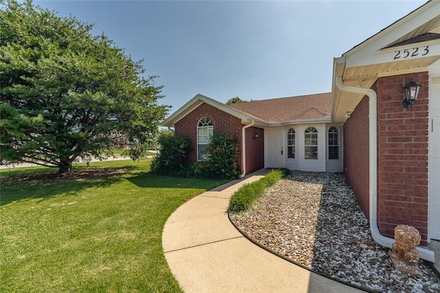 2523 Meadow Lake St, Springdale, AR 72764 - property entrance featuring a lawn and brick siding