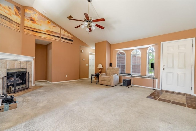 2523 Meadow Lake St, Springdale, AR 72764 - entryway with carpet, ceiling fan, a tile fireplace, and high vaulted ceiling