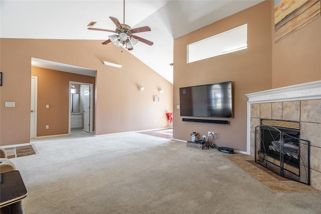 2523 Meadow Lake St, Springdale, AR 72764 - unfurnished living room with carpet floors, ceiling fan, high vaulted ceiling, and a tile fireplace