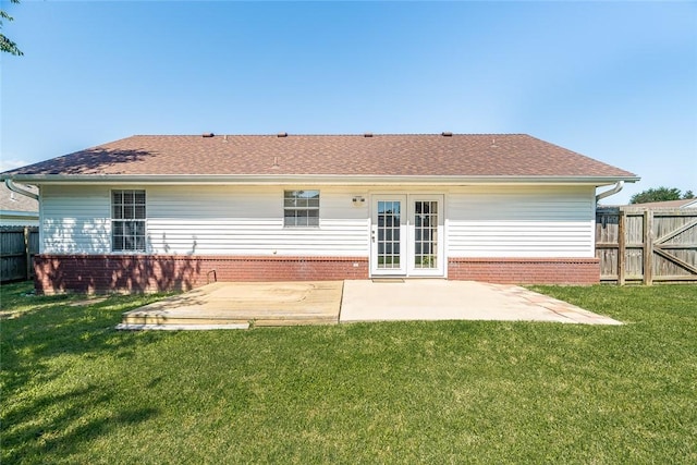 2523 Meadow Lake St, Springdale, AR 72764 - back of house featuring brick siding, a patio, and a shingled roof