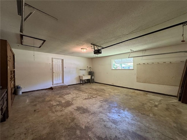 811 Overlook Dr, Mountain Home, AR 72653 - garage featuring a garage door opener and electric water heater