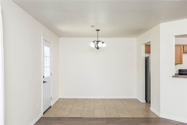 374 Meszaros Ct, Pea Ridge, AR 72751 - unfurnished dining area featuring light wood-type flooring and baseboards