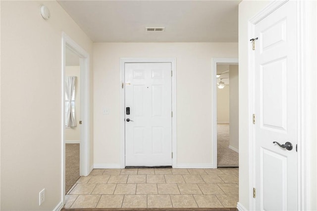374 Meszaros Ct, Pea Ridge, AR 72751 - foyer with light carpet and light tile patterned floors