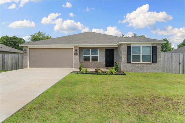 2586 Chittick St, Pea Ridge, AR 72751 - single story home with brick siding, a garage, and concrete driveway