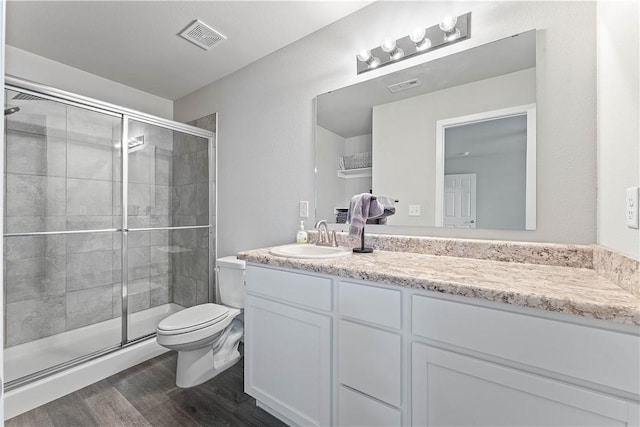 2586 Chittick St, Pea Ridge, AR 72751 - bathroom featuring vanity, wood finished floors, and a shower stall