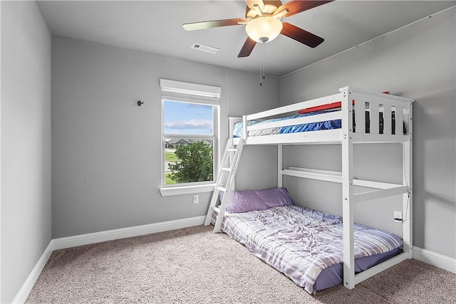 1001 Kimball Ln, Pea Ridge, AR 72751 - carpeted bedroom with baseboards and a ceiling fan