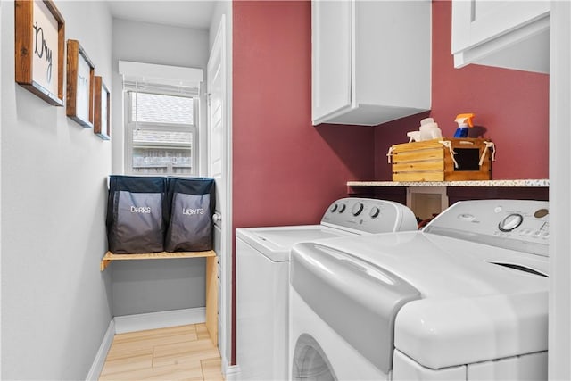 1001 Kimball Ln, Pea Ridge, AR 72751 - laundry room featuring independent washer and dryer and cabinet space