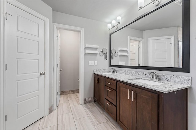 1001 Kimball Ln, Pea Ridge, AR 72751 - full bath with double vanity and baseboards
