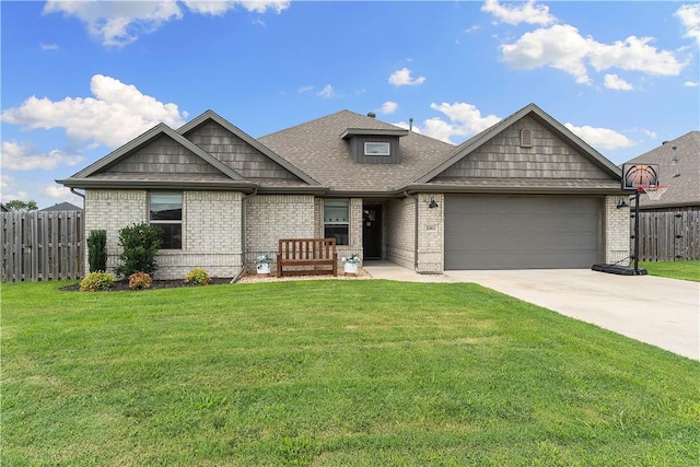 1001 Kimball Ln, Pea Ridge, AR 72751 - craftsman house featuring an attached garage, concrete driveway, brick siding, and a shingled roof