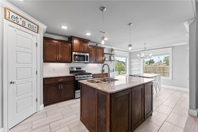 1001 Kimball Ln, Pea Ridge, AR 72751 - kitchen with appliances with stainless steel finishes, tasteful backsplash, crown molding, decorative light fixtures, and light stone countertops