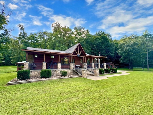 8500 Rock Creek Rd, Mulberry, AR 72947 - view of front of house featuring covered porch, a front lawn, and stone siding