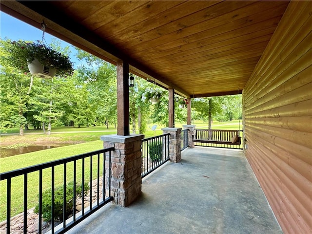 8500 Rock Creek Rd, Mulberry, AR 72947 - porch with a lawn and view of wooded area