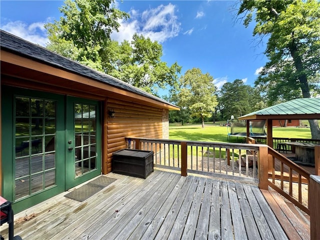 8500 Rock Creek Rd, Mulberry, AR 72947 - wooden deck featuring french doors, a trampoline, a yard, and a gazebo