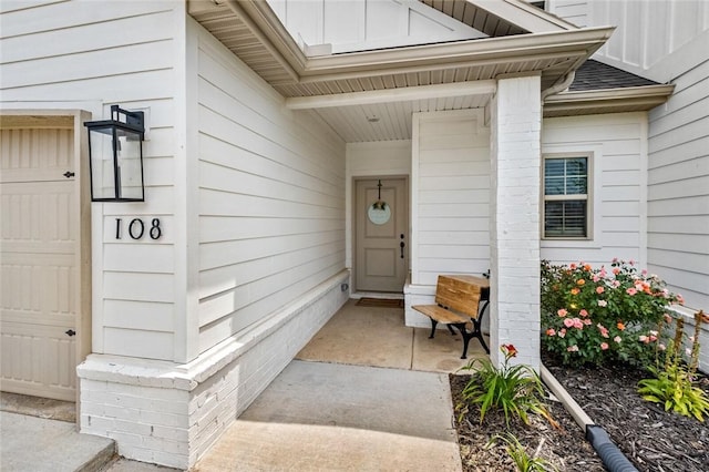 108 Dobson St, Pea Ridge, AR 72751 - entrance to property featuring board and batten siding and roof with shingles