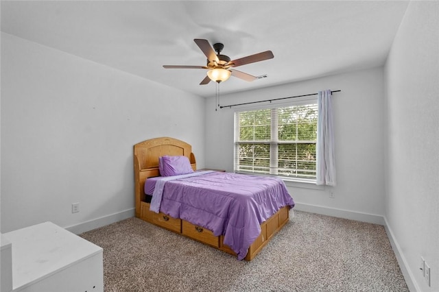 108 Dobson St, Pea Ridge, AR 72751 - carpeted bedroom with baseboards and a ceiling fan