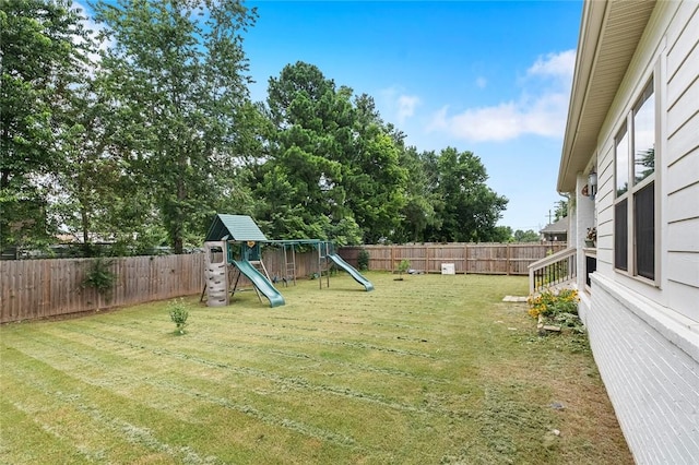 108 Dobson St, Pea Ridge, AR 72751 - fenced backyard featuring a playground