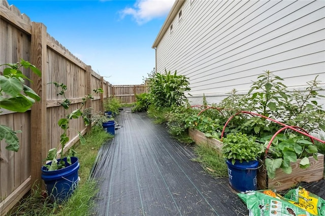 108 Dobson St, Pea Ridge, AR 72751 - wooden deck featuring a fenced backyard