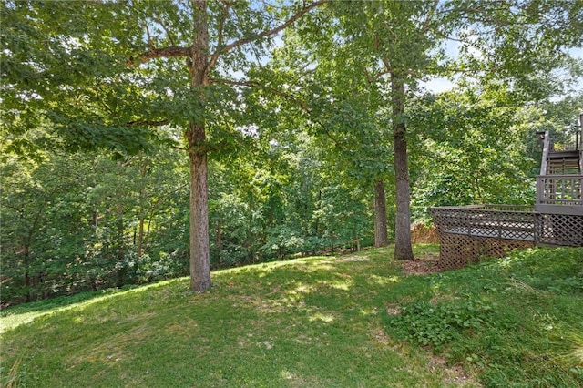 9382 Grimes Dr, Rogers, AR 72756 - view of grassy yard with a wooden deck