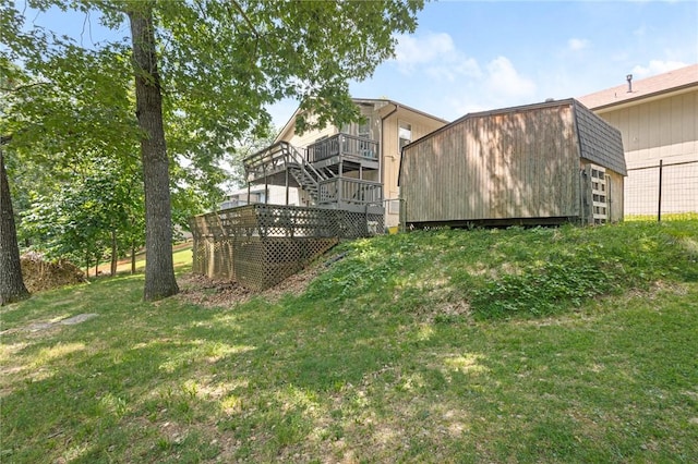 9382 Grimes Dr, Rogers, AR 72756 - rear view of property featuring a lawn, a wooden deck, and stairway