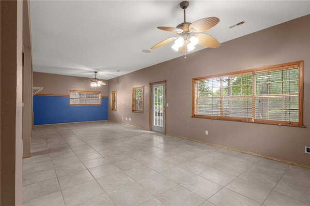9382 Grimes Dr, Rogers, AR 72756 - spare room featuring ceiling fan and light tile patterned flooring
