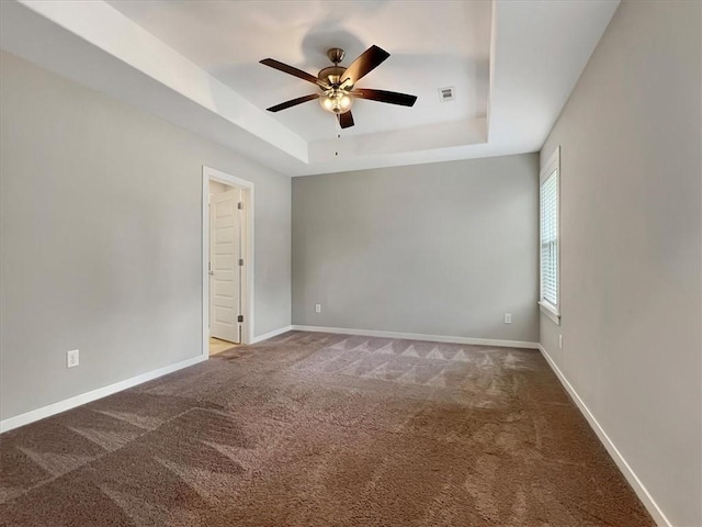 217 Idaho Ave, Farmington, AR 72730 - carpeted empty room featuring a tray ceiling and a ceiling fan