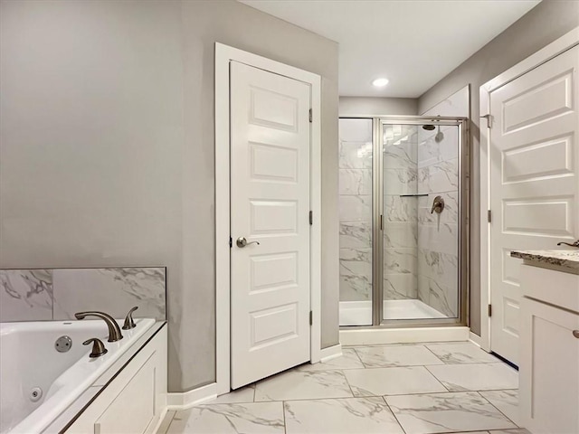 217 Idaho Ave, Farmington, AR 72730 - bathroom featuring a marble finish shower, a whirlpool tub, marble look tile flooring, vanity, and recessed lighting