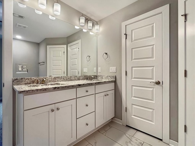 217 Idaho Ave, Farmington, AR 72730 - full bath with double vanity and marble finish floors
